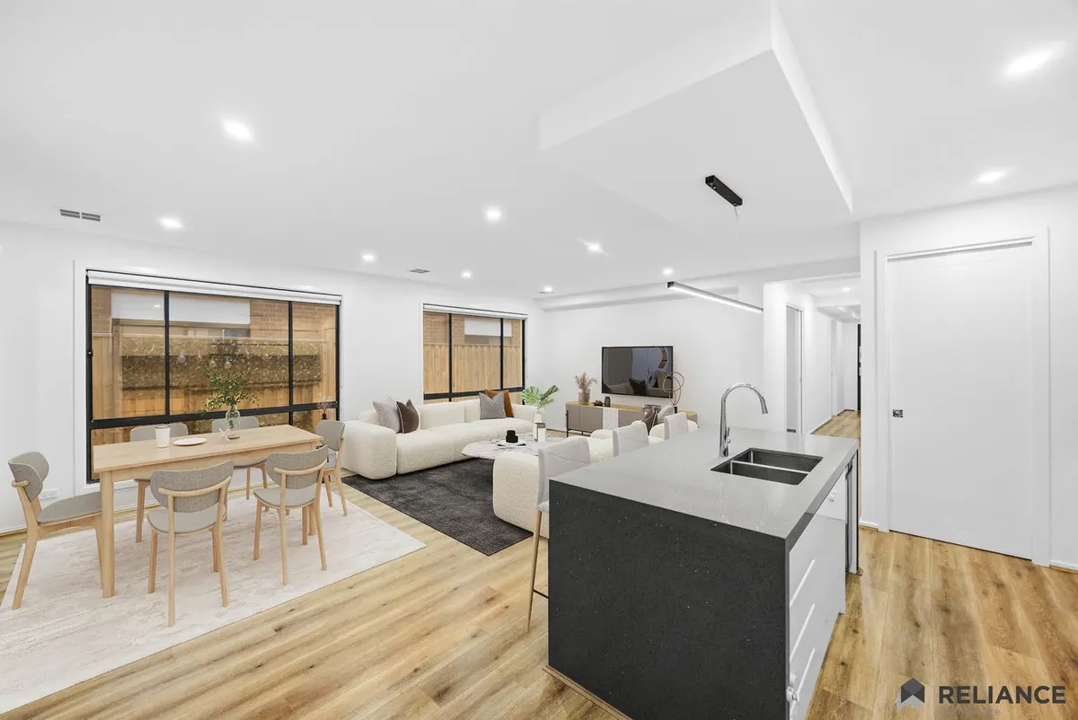 Open-plan living, dining and kitchen area in a contemporary home