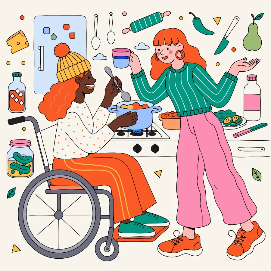 A support worker and a wheelchair user preparing a meal together in the kitchen.